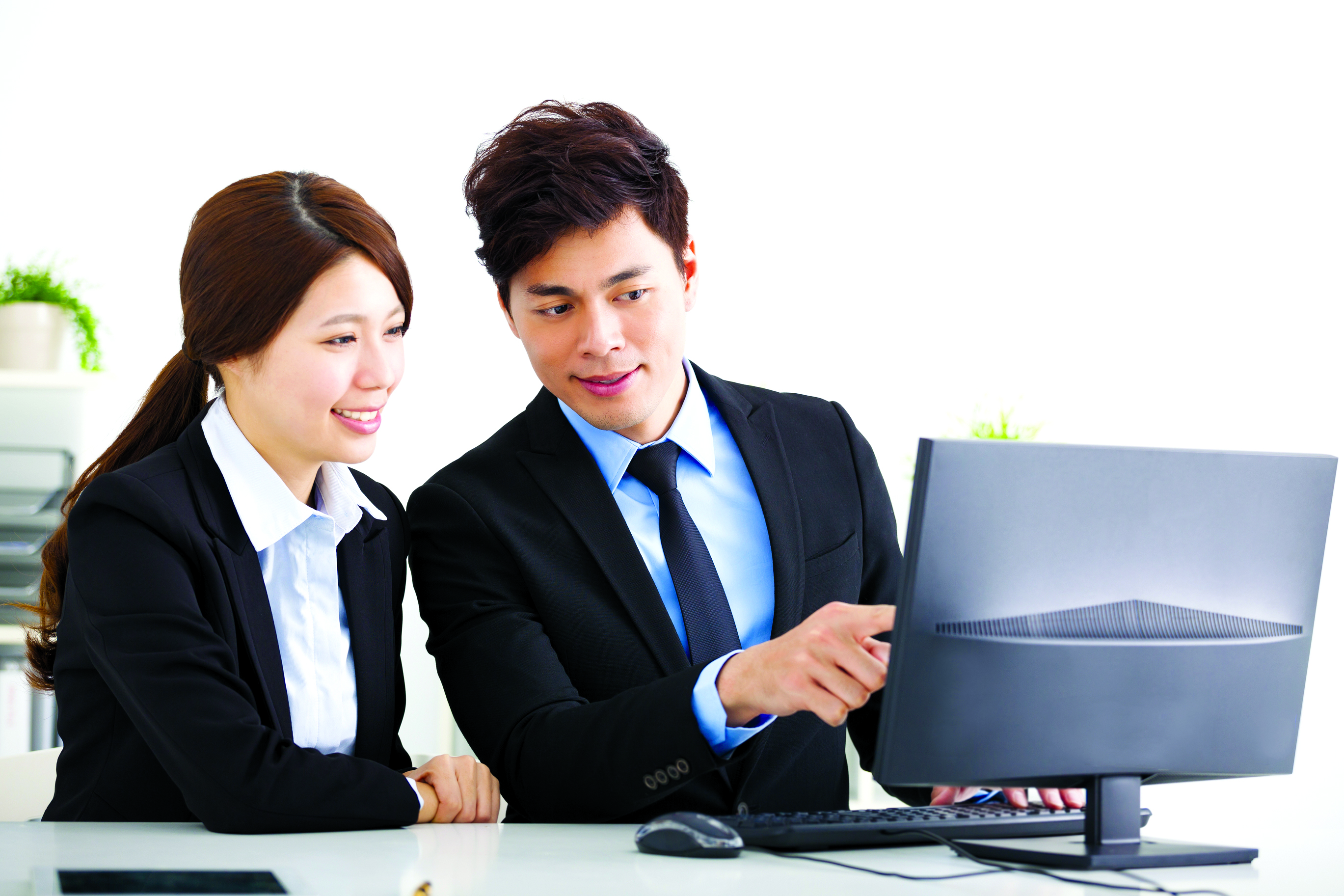 Co-workers discussing IT manpower management